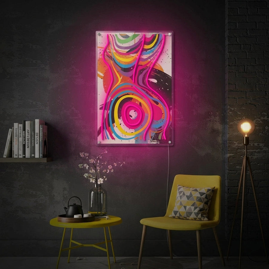 Lifestyle mockup of the Glow Goddess neon sign glowing with a warm light in a beautifully styled modern bedroom.