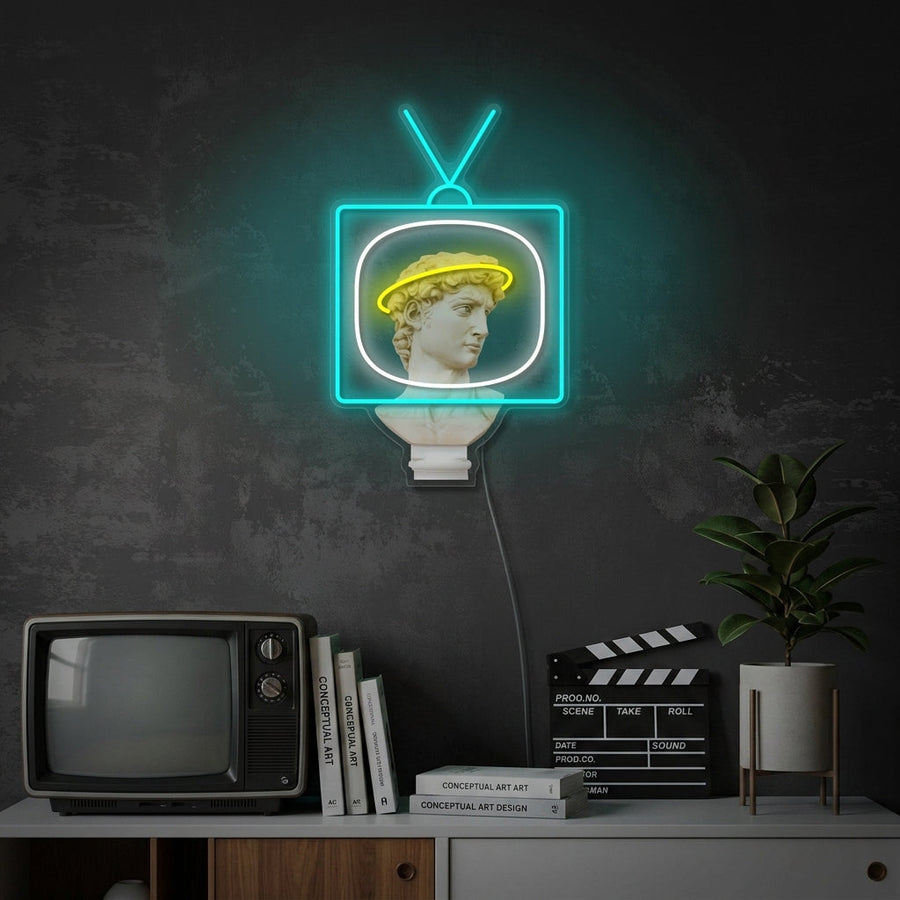 A glowing blue 'David Broadcast' neon sign, featuring a stylized bust with antennas, mounted on a dark textured wall in a modern living space.