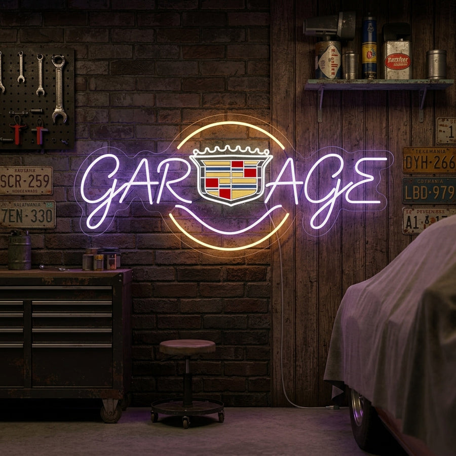 A lifestyle photo showing the illuminated Cadillac Garage neon sign on a textured brick wall in a rustic, well-lit garage setting.