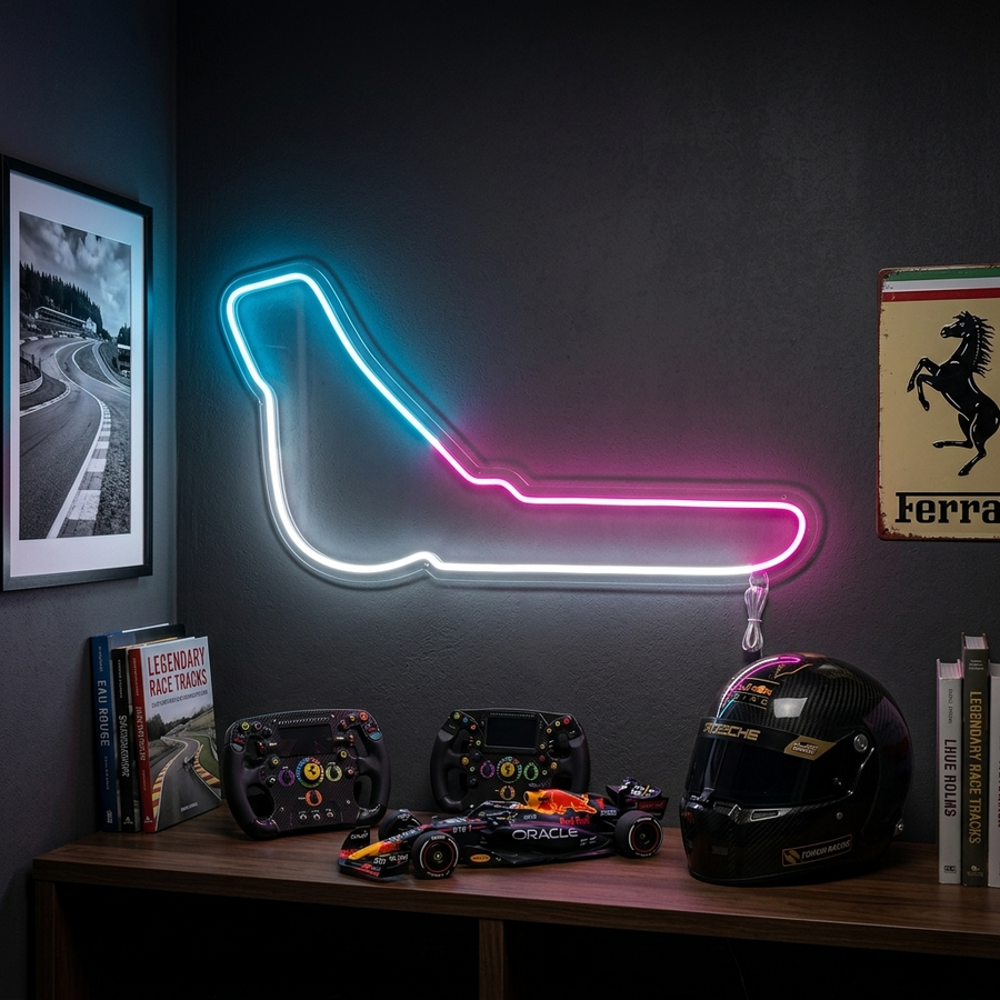 A glowing red neon sign depicting the outline of the Italy Monza F1 track mounted on a wall in a home setting.