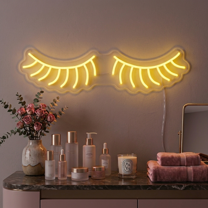 Stylish Simple Lashes neon sign glowing in a modern beauty salon setting.