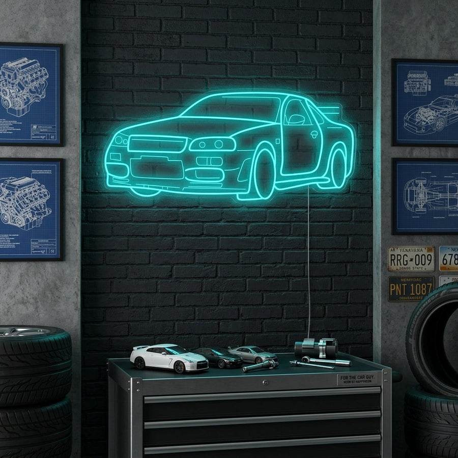 A lifestyle mockup showing the glowing GTR Car neon sign mounted on a brick wall in a modern garage setting.