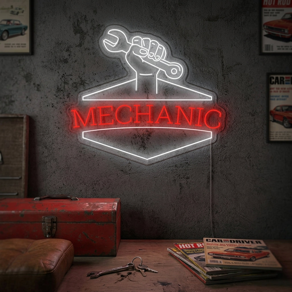 A glowing 'Mechanic' word neon sign mounted above a workbench in a workshop or garage setting.