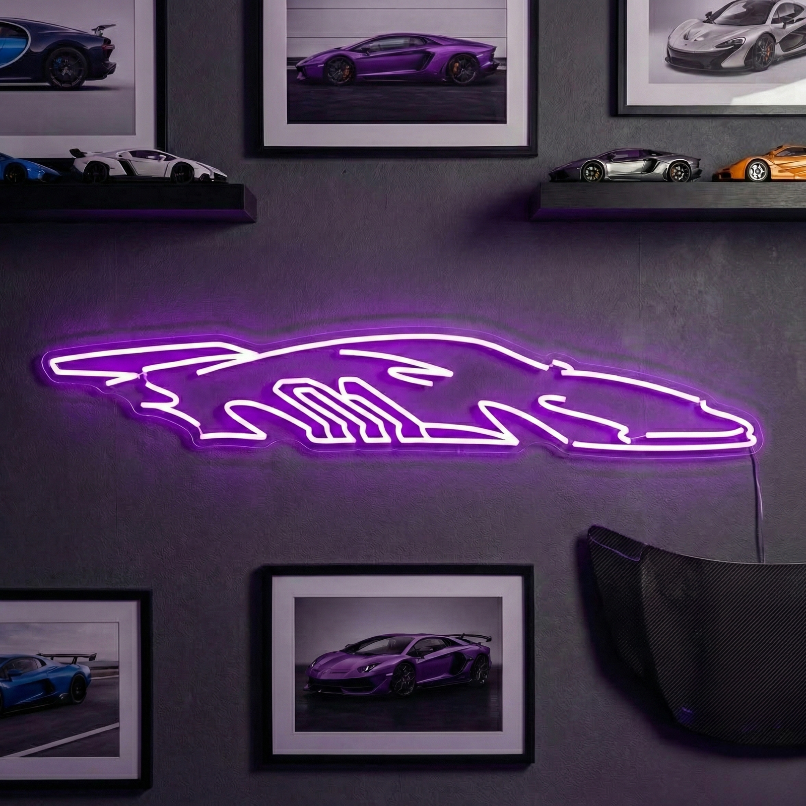 A real neon sign depicting a race car profile glowing on a garage wall, surrounded by model cars and memorabilia.