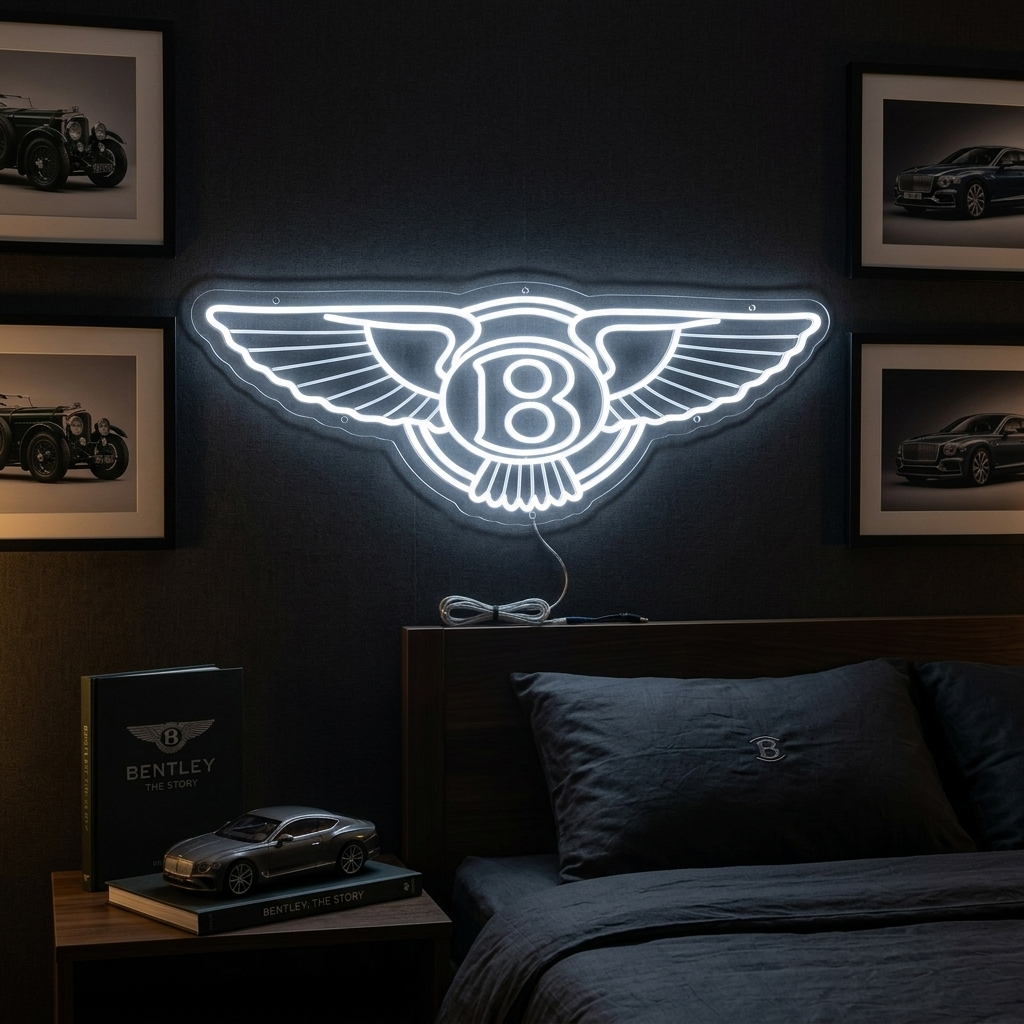 A real, glowing, high-quality neon sign featuring a custom luxury car-inspired logo mounted on a clear acrylic backing, displayed on a wooden headboard in a bedroom setting.