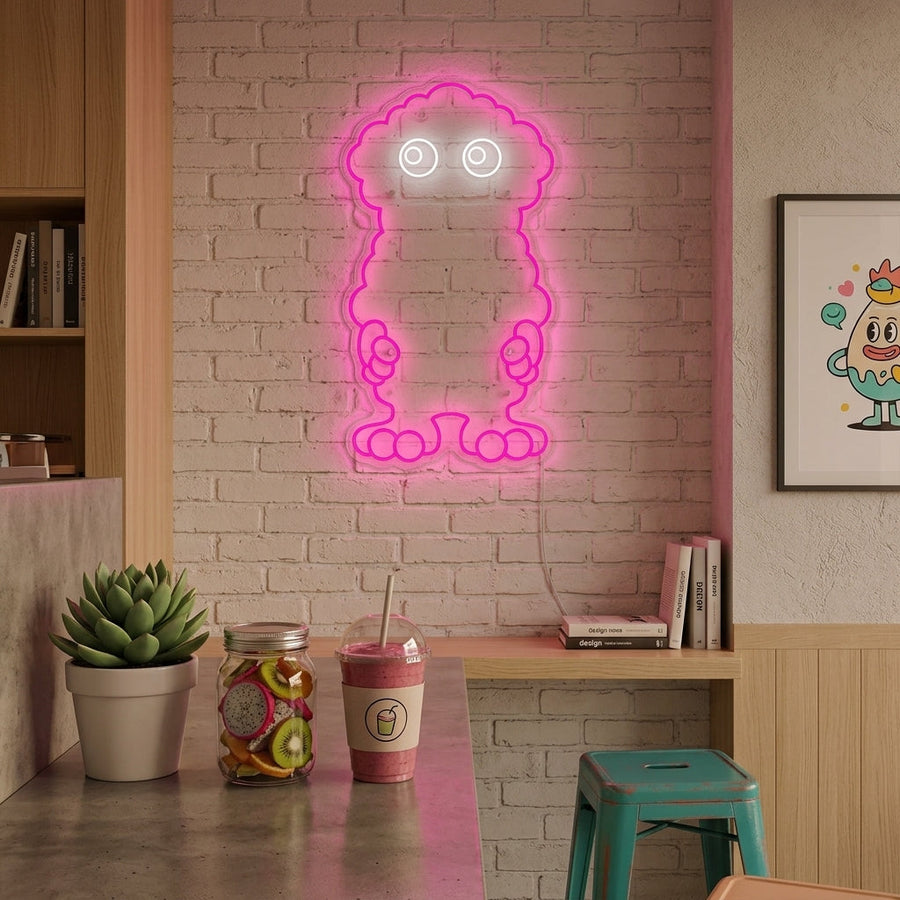 A charming Scoop Neon Sign glowing softly against a minimalist wall, creating a warm, playful atmosphere in a modern room setting.