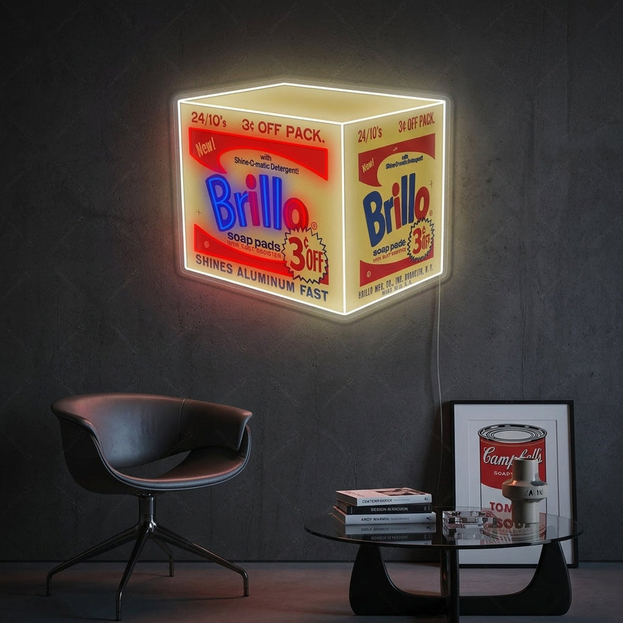 A stylish modern living room featuring a glowing Brillo Box Pop Art neon sign mounted on the wall.