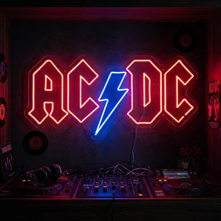 Vibrant ACDC neon sign featuring the iconic lightning bolt logo glowing on a textured wall.