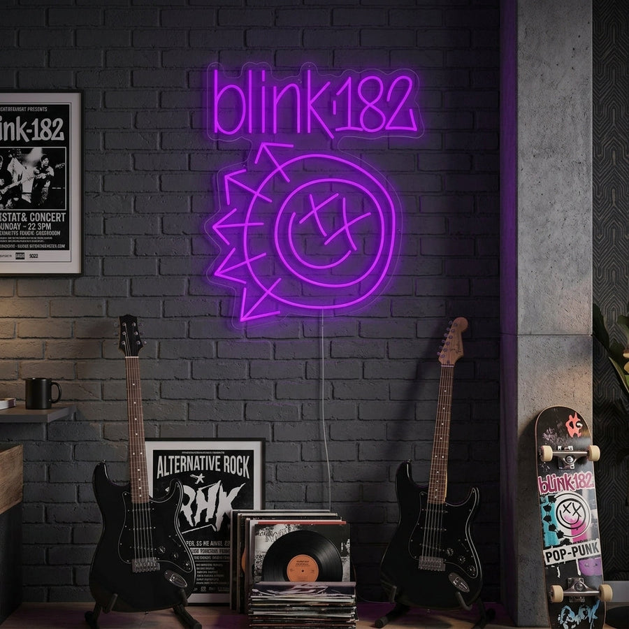 A Blink-182 neon sign, handcrafted, lighting up a modern room.