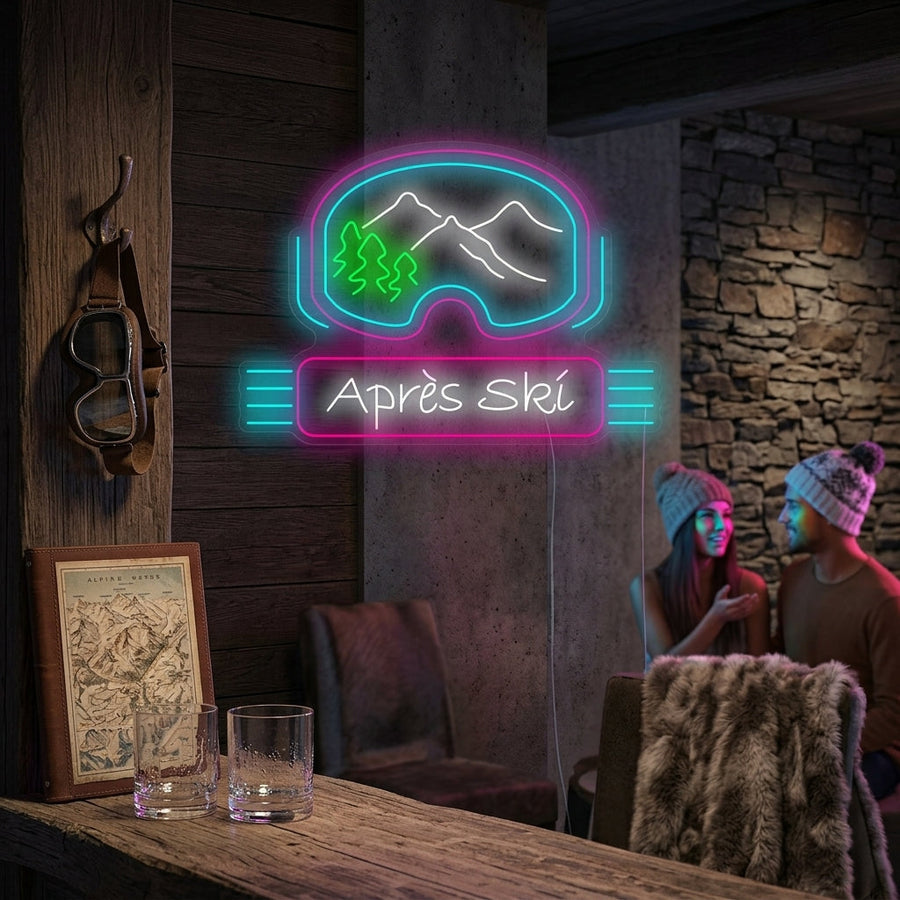 A glowing 'Apres Ski' script neon sign displayed above a rustic fireplace in a cozy wooden mountain cabin setting.