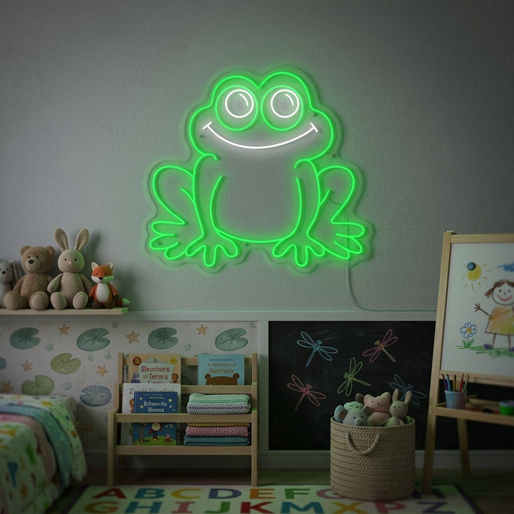 A cozy child's bedroom with a glowing green frog neon sign mounted on the wall above a wooden shelf, illuminating a stack of colorful books and toys.