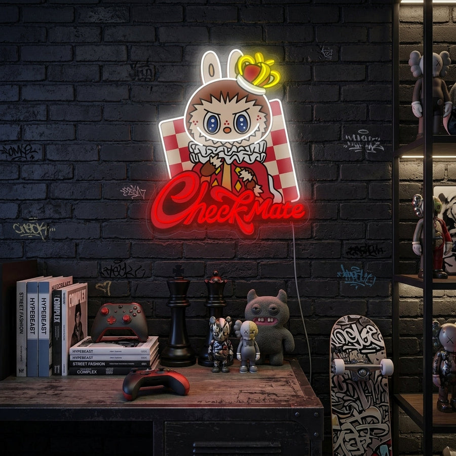 A glowing neon sign featuring a custom monster character and the text 'Monster Let's Checkmate' mounted on a concrete wall in a modern living room setting.