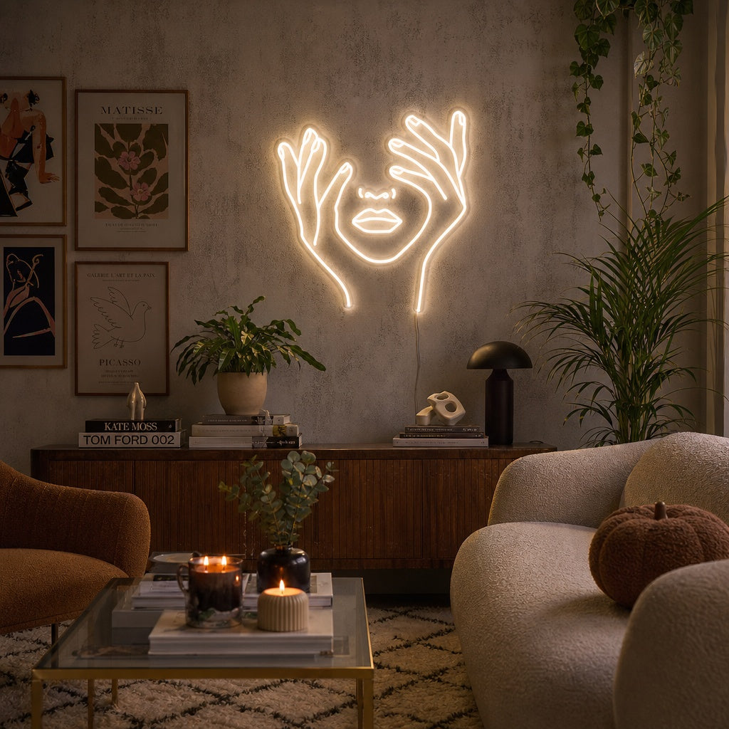 Abstract Face Hand Neon Sign illuminating a modern living room