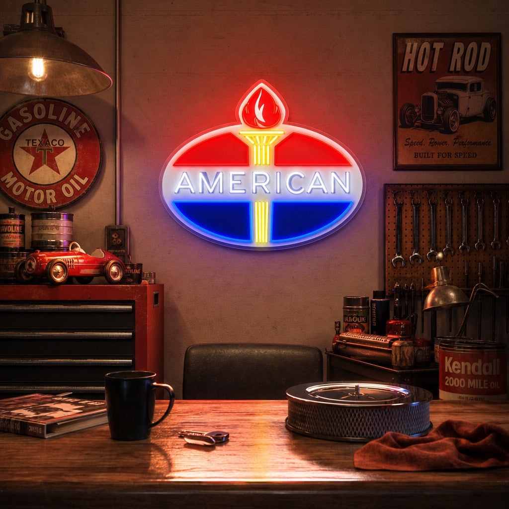 American Gasoline Logo UV print neon sign glowing bright blue and red on a brick wall in a retro garage setting.