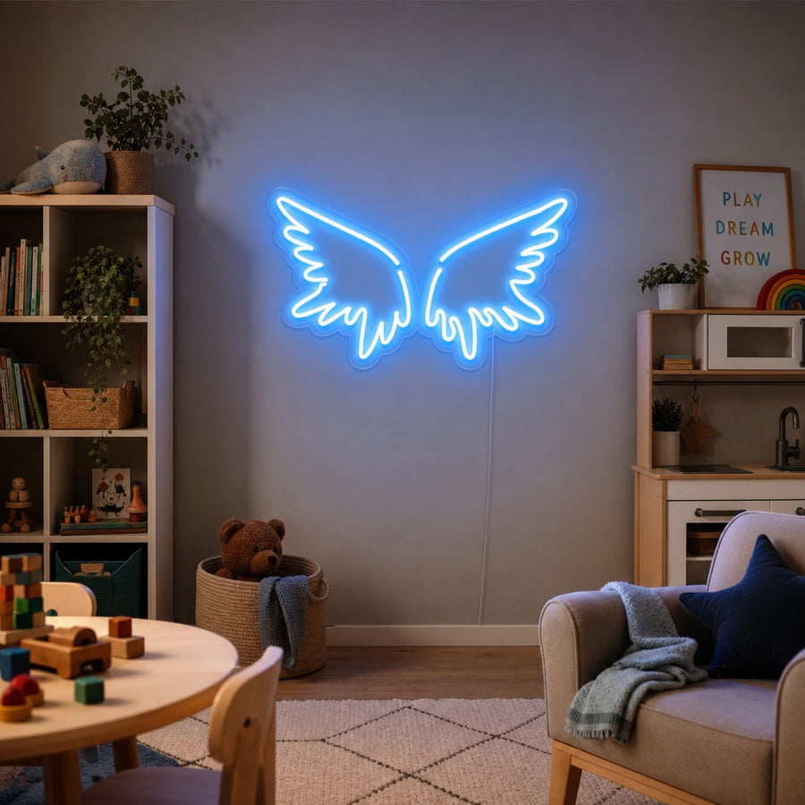 A stunning 'Angel Wings' neon sign glowing softly on a bedroom wall above a cozy bed.
