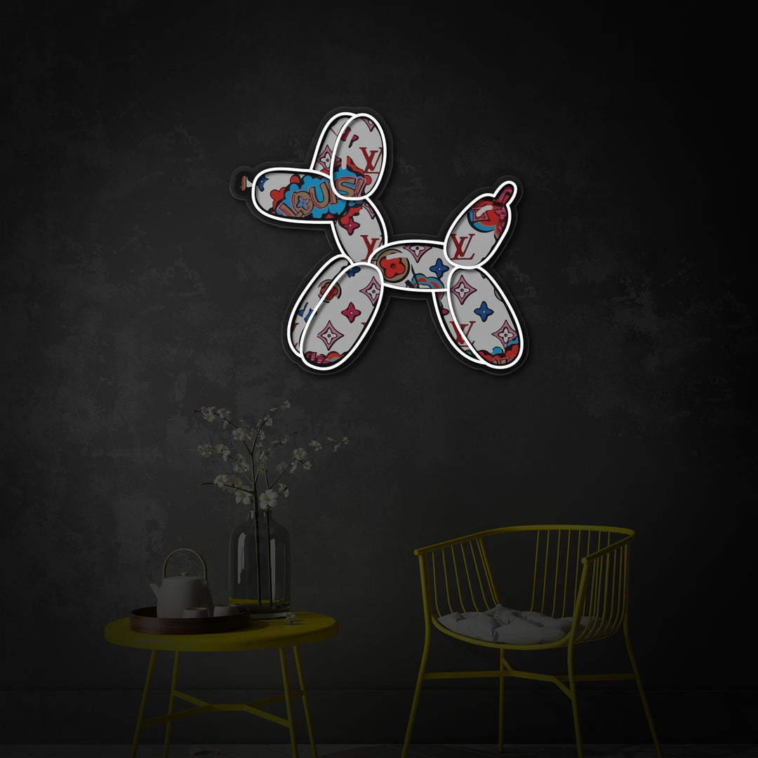 A well-lit contemporary office space featuring the Balloon Dog UV Print Neon Sign as colorful wall decor above a desk.