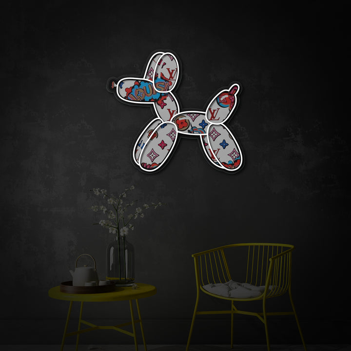 A well-lit contemporary office space featuring the Balloon Dog UV Print Neon Sign as colorful wall decor above a desk.