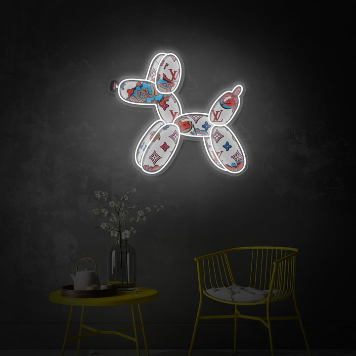 Close-up of the glowing Balloon Dog neon sign with clear UV print details against a dark blue brick wall at night.