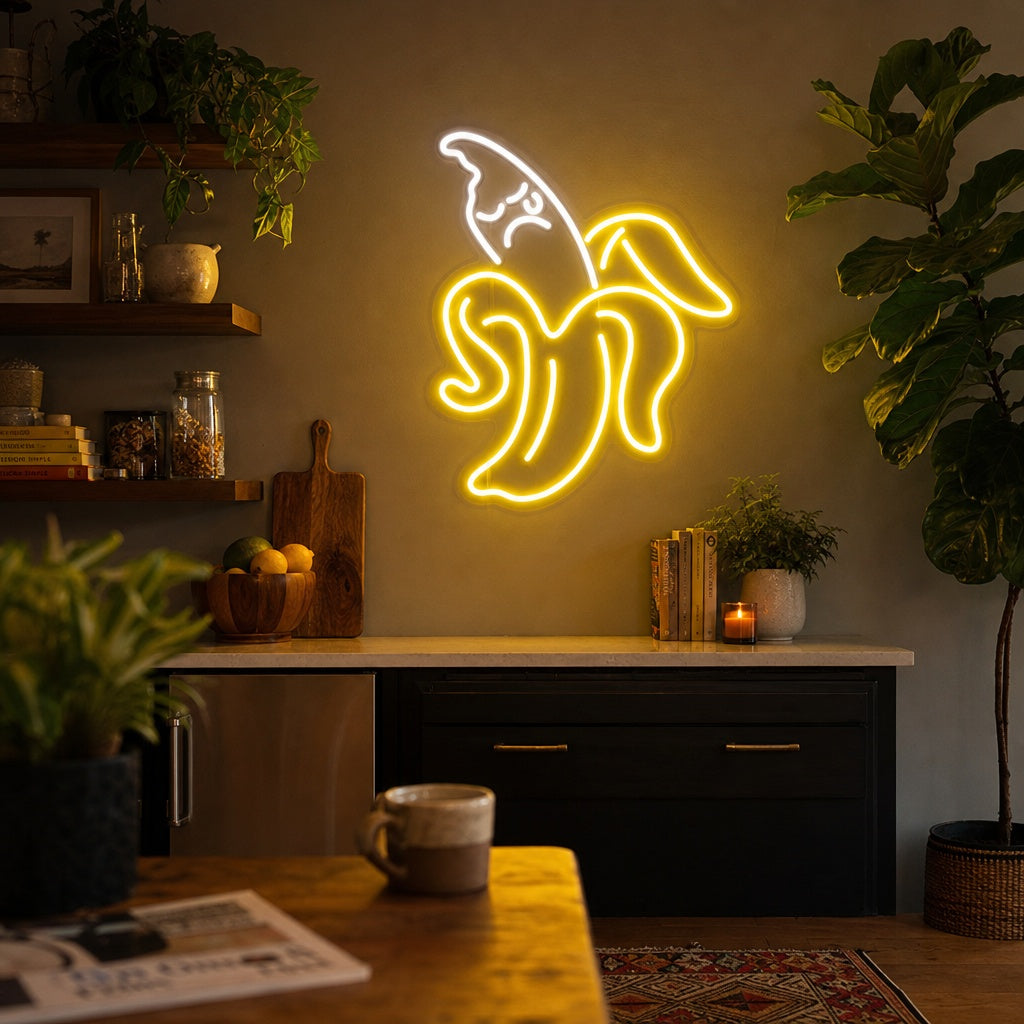 A glowing yellow and green Banana neon sign displayed on a white brick wall above a cozy seating area in a modern cafe.