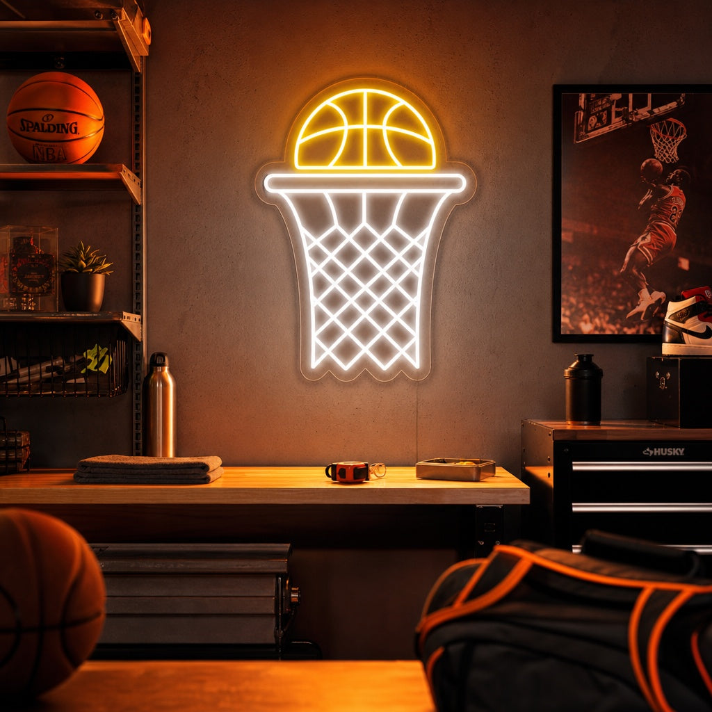 Vibrant glowing neon sign depicting a basketball hoop and net, casting a orange light in a sports-themed room setting.