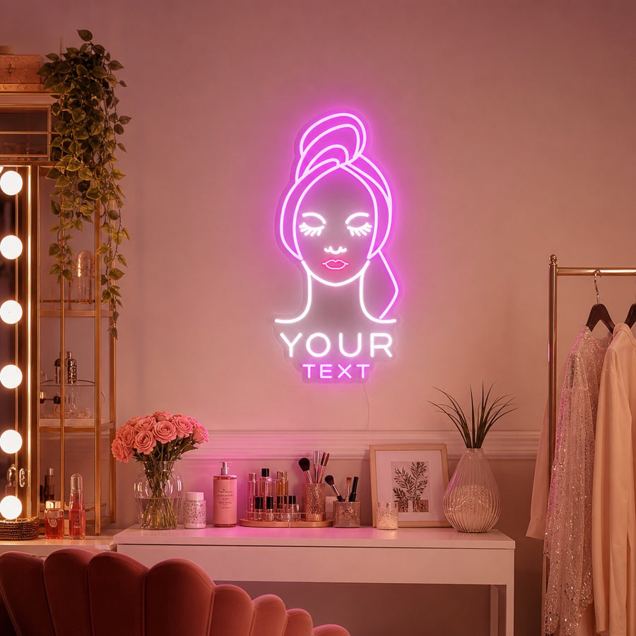 A custom text neon sign glowing softly on a beautifully decorated wall in a modern beauty salon reception area.
