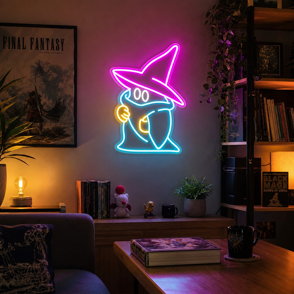 Black Mage neon sign featuring a wizard silhouette casting a glowing spell, mounted on a wall above a wooden desk with a computer setup and plants.