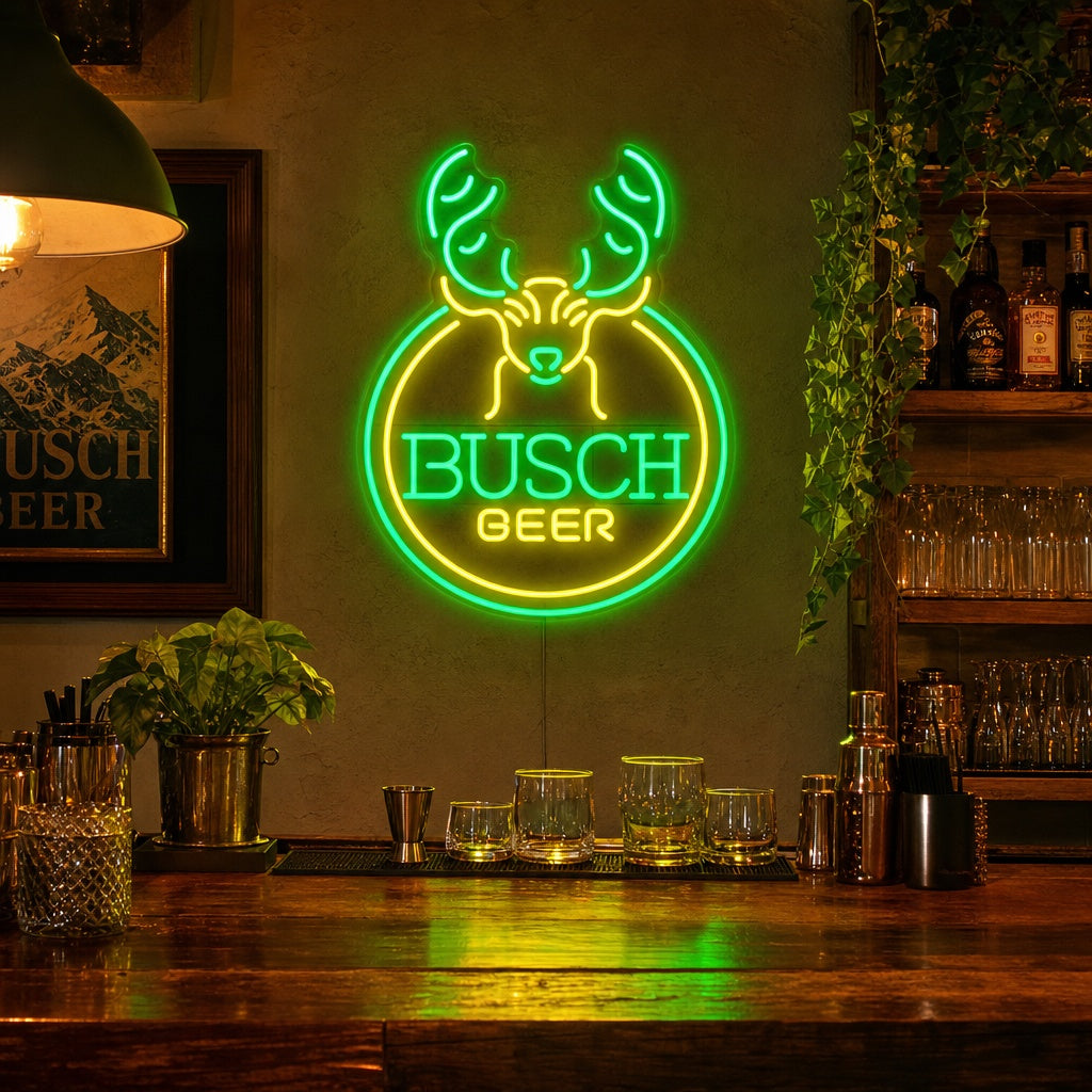 Lifestyle view of a glowing neon sign featuring a deer head and beer glass with the text 'BUSCH GEER' and 'DEER BAR' in a rustic bar setting