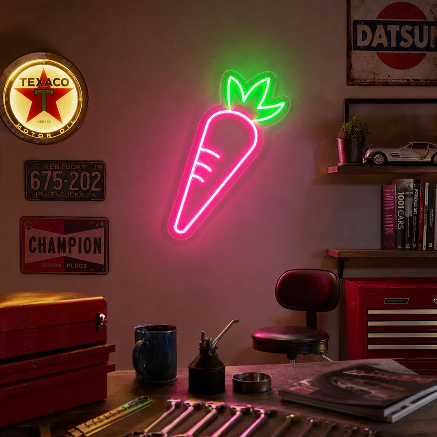 Vibrant orange and green carrot neon sign illuminated on a textured wall above a child's desk, showcasing a cheerful glow for a kids' room setting.