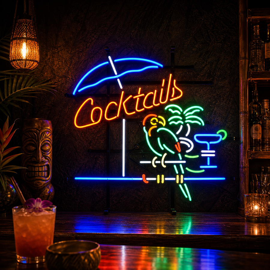 A hand-fabricated vintage neon sign depicting a parrot and the word 'Cocktails', mounted on a black grid frame against a rustic wall.