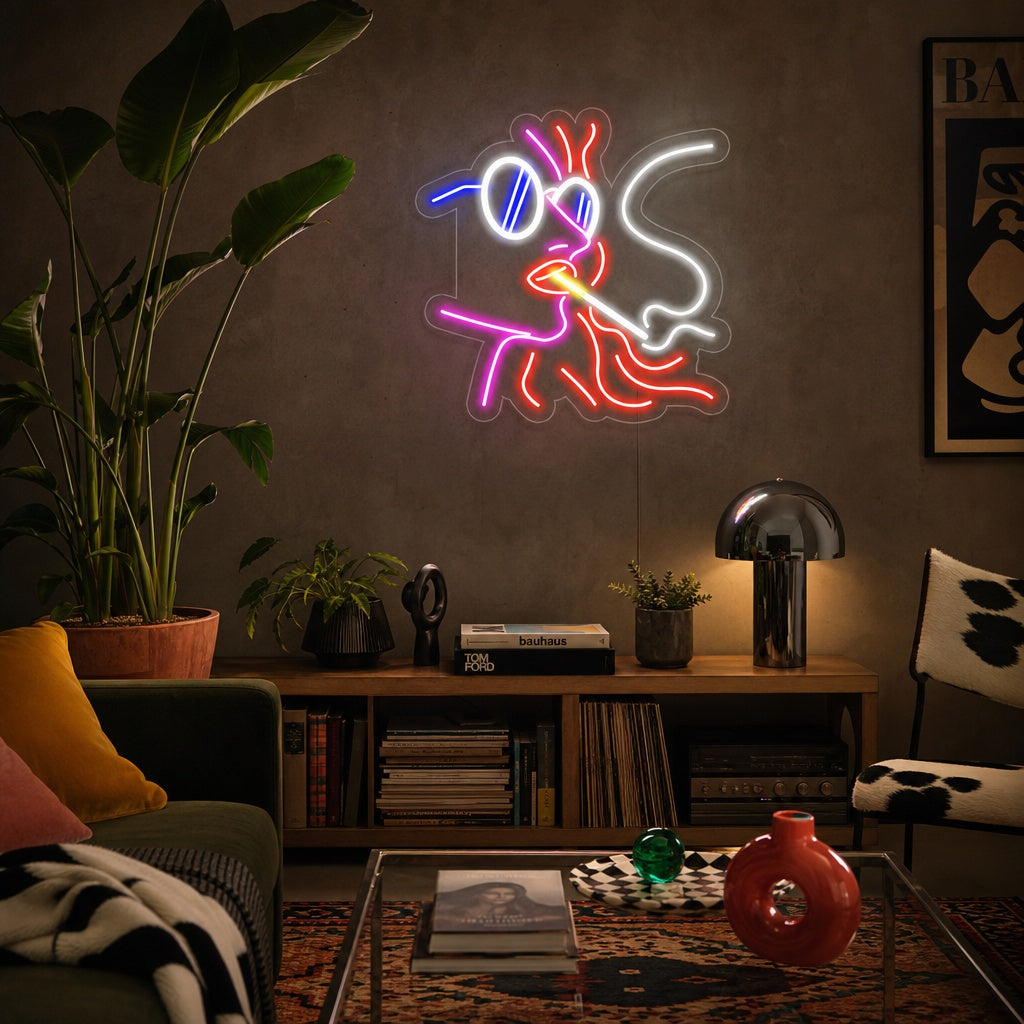 A lifestyle photograph of the Freethinking Woman neon sign glowing on a textured wall.