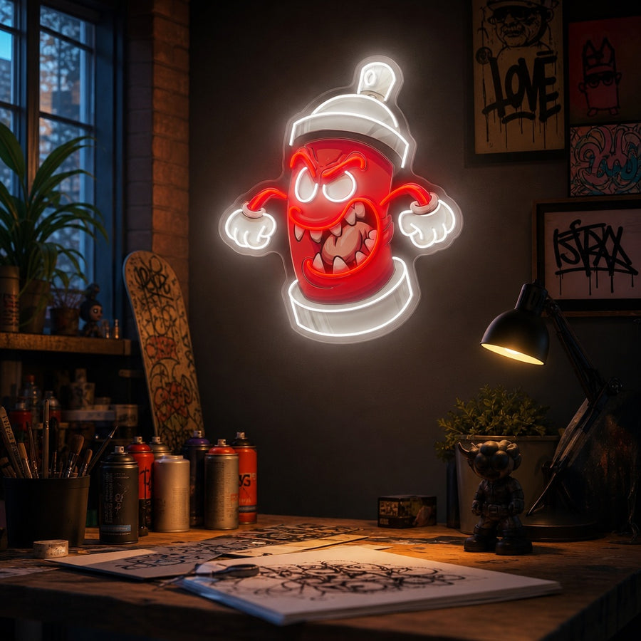 Graffiti Spray Can Monster UV Print LED Neon Sign glowing brightly in a cozy room, mounted on a dark textured wall above a chair and table.