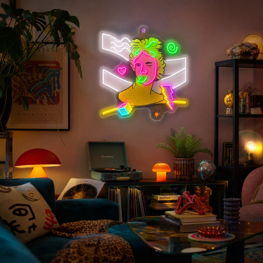 A vibrant UV print neon sign featuring a surreal, trippy classical Greek sculpture design, displayed against a dark wall.