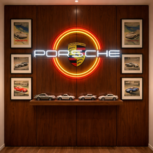 Circular neon wall sign featuring a sleek sports car profile glowing red against a dark garage background.