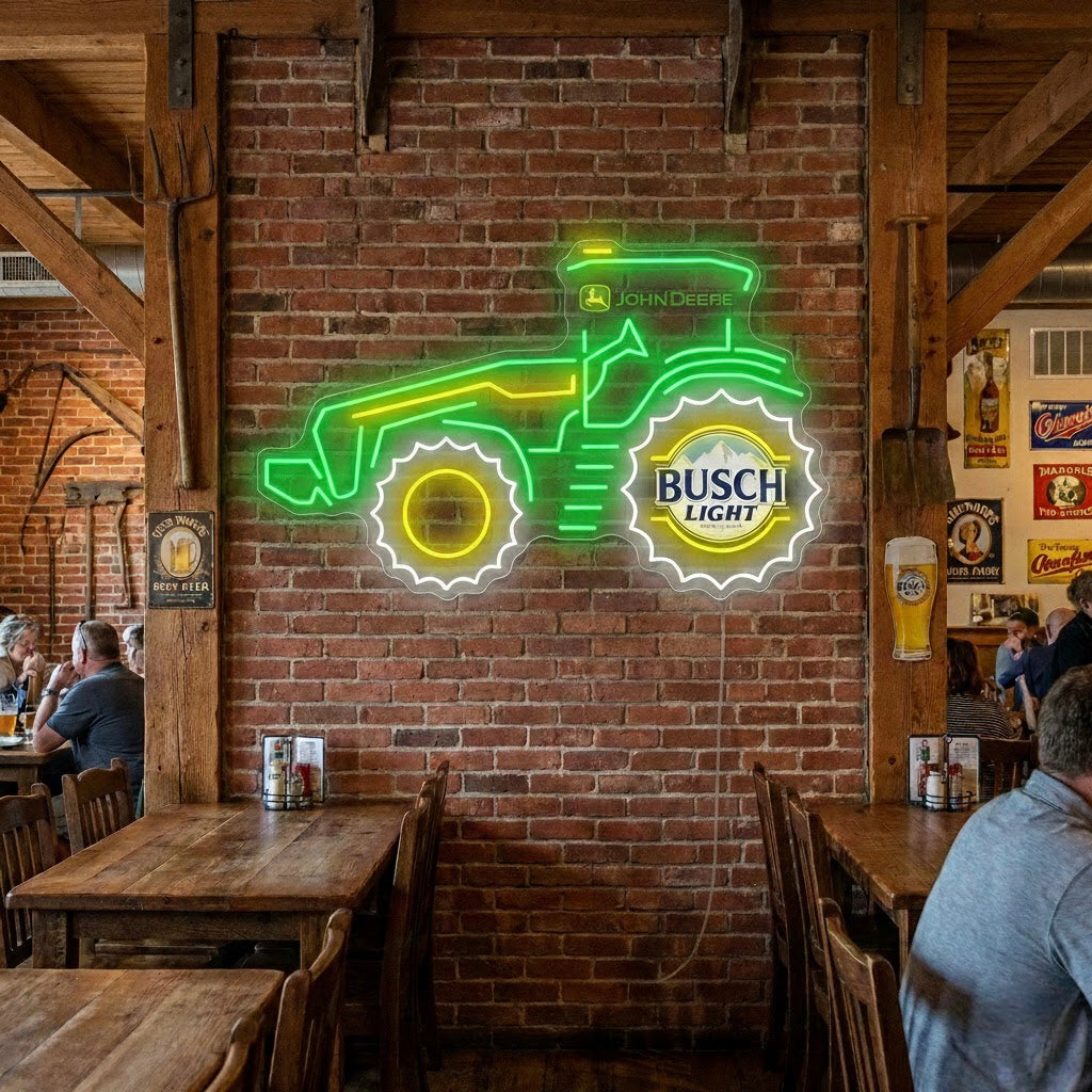A custom Farmer Tractor and Beer neon sign glowing warmly on a rustic barn wall next to antique farm tools and a wooden shelf with bottles.