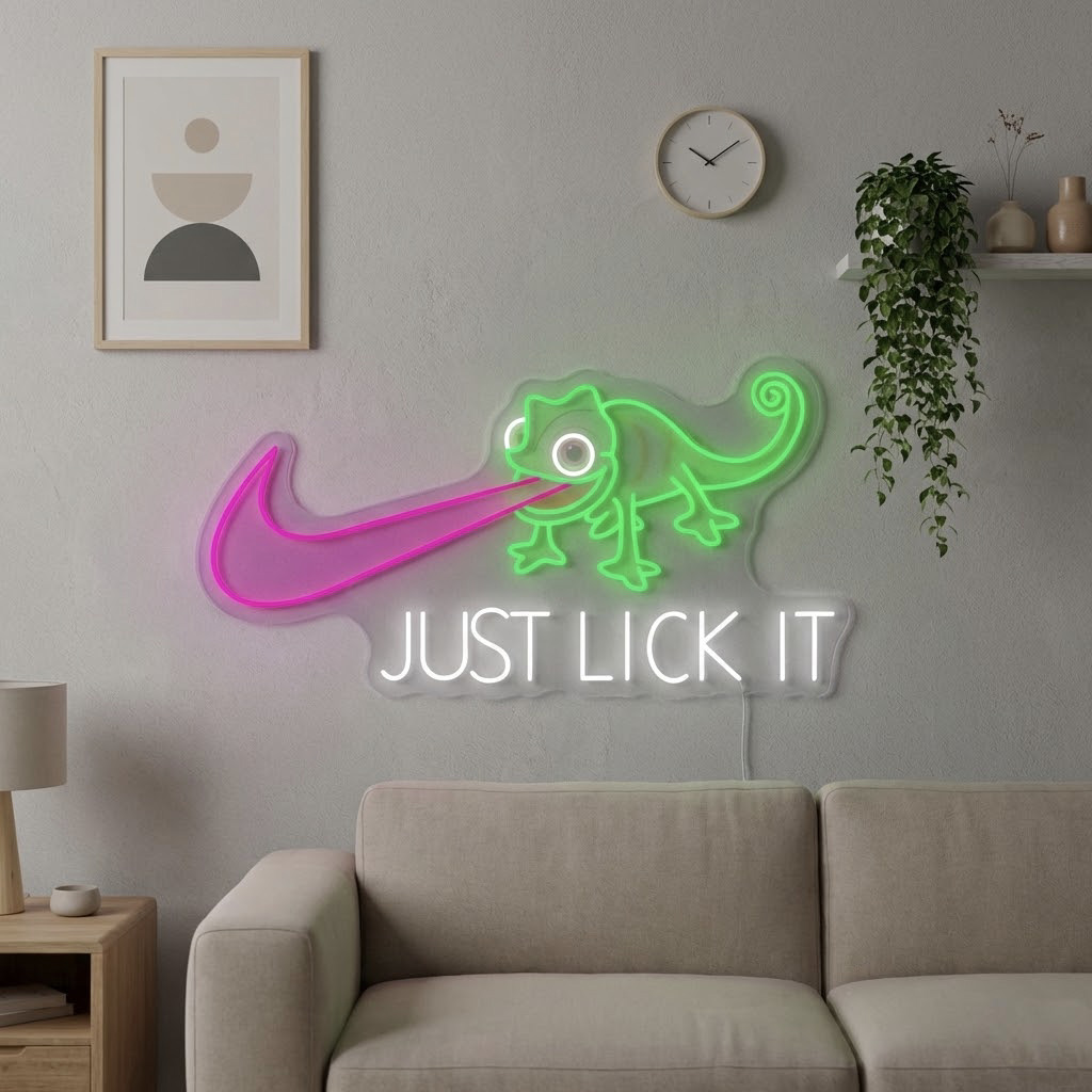 A lifestyle photo of the Just Lick It UV Print Neon Sign glowing vibrantly on a textured wall in a modern living room setting.