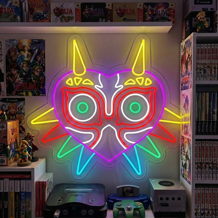 Glowing Dark Fantasy Mask neon wall sign in a detailed game room with video game collectibles and amiibos