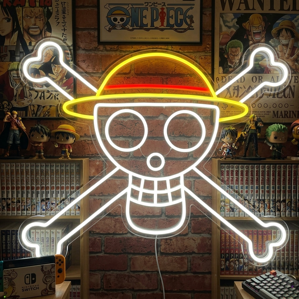 Vibrant Pirate Anime Symbol neon sign glowing red, showing a skull with a classic straw hat, mounted above a wooden desk with gaming peripherals.