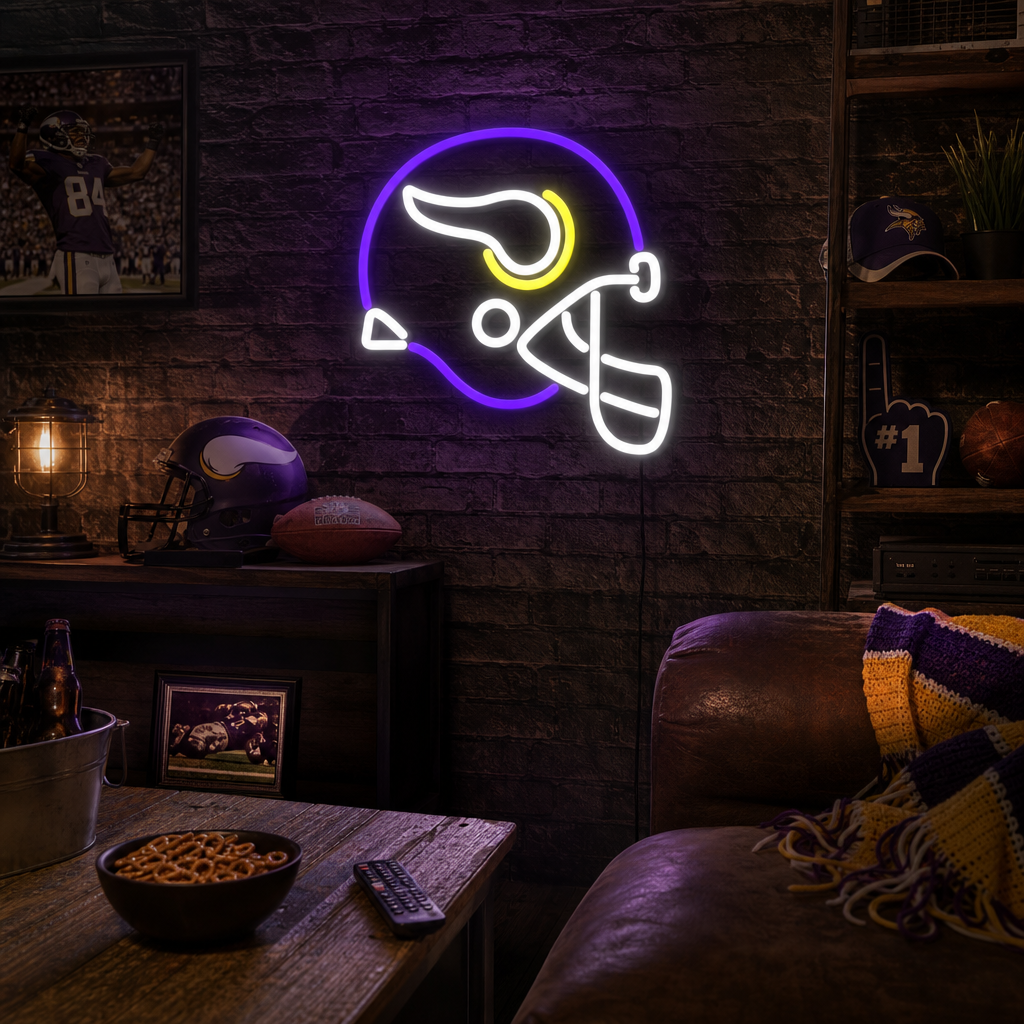A lifestyle shot of the lit 'Minnesota Helmet' neon sign glowing brightly on a brick wall in a rustic home bar setting, surrounded by subtle sports memorabilia.