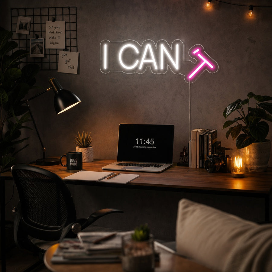 The illuminated 'I CAN T' neon sign with clear tubing and acrylic backing.