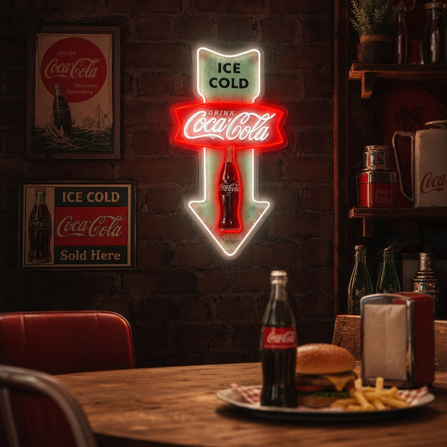 Ice Cold Cola Vintage Diner Arrow neon sign graphic design featuring a glowing arrow pointing down, a cola bottle, and classic typography.