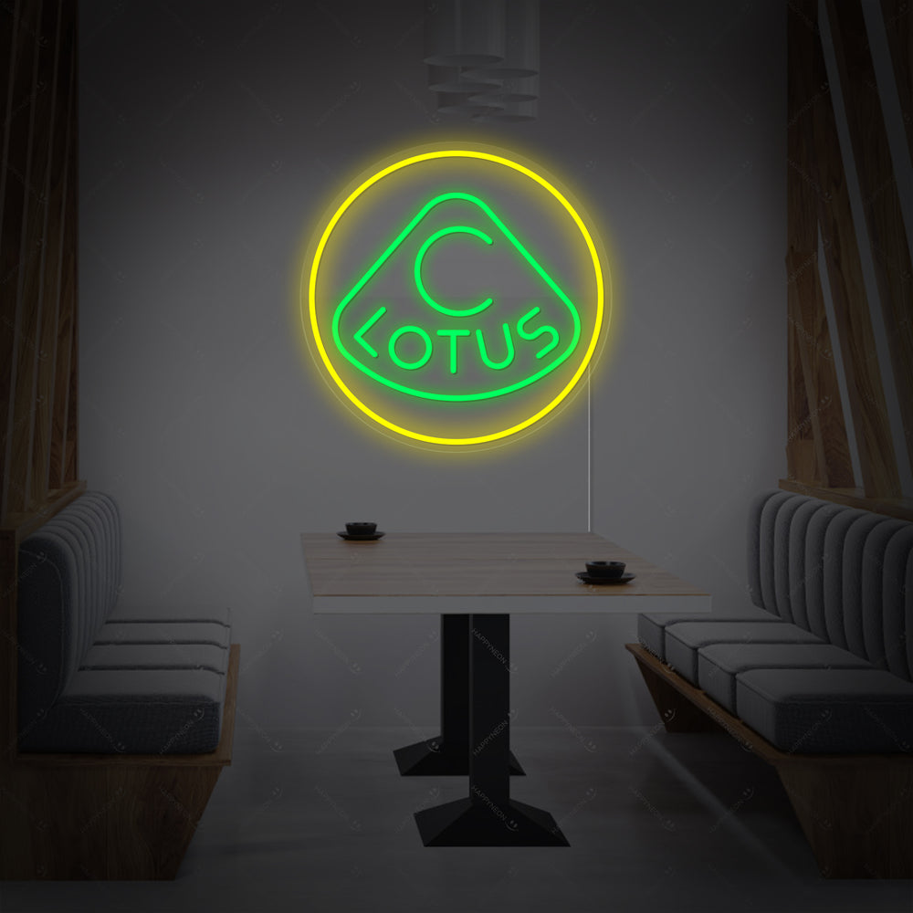 A custom 'LOTUS' neon sign with a clear acrylic backing, displayed as unique wall art in a commercial setting.