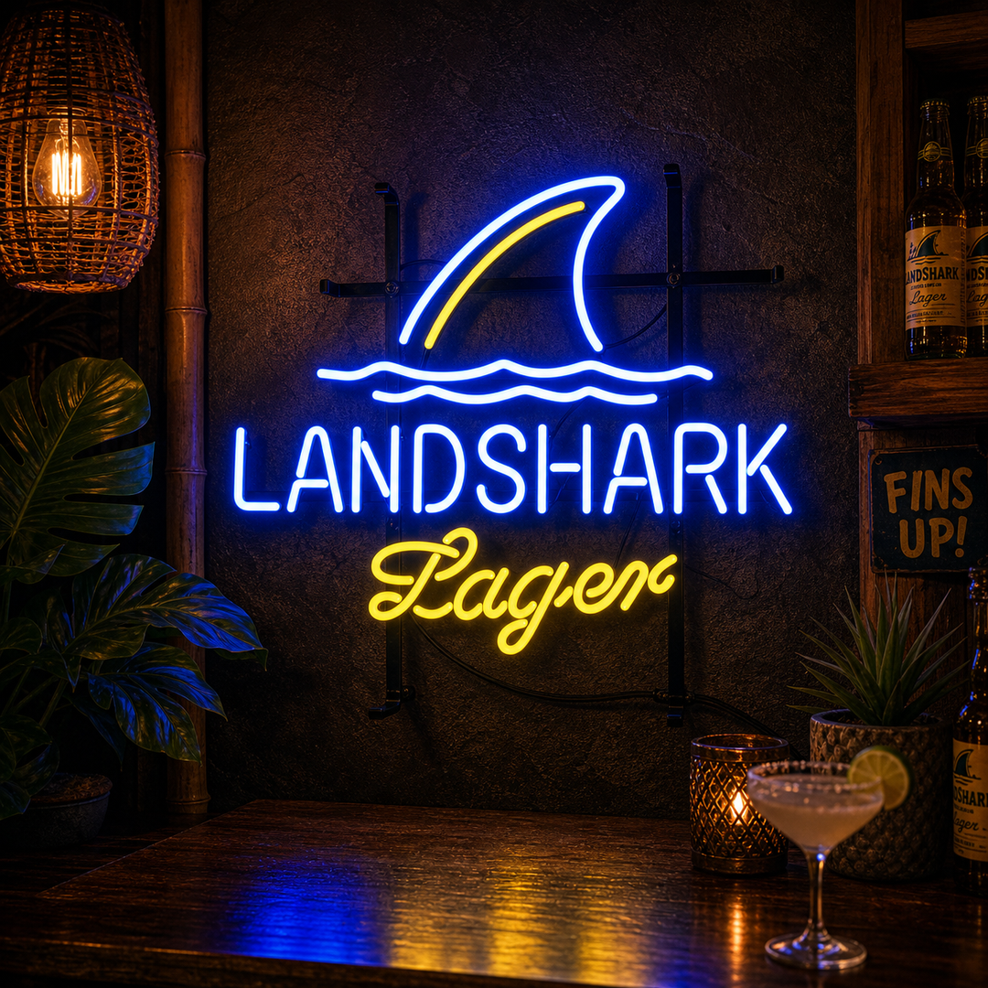 Landshark Lager Beer yellow and red neon sign glowing in a dimly lit bar setting.