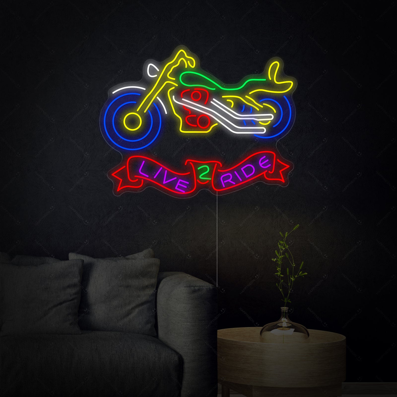 The 'Live 2 Ride' neon sign glowing brightly in blue script on an clear acrylic backing.