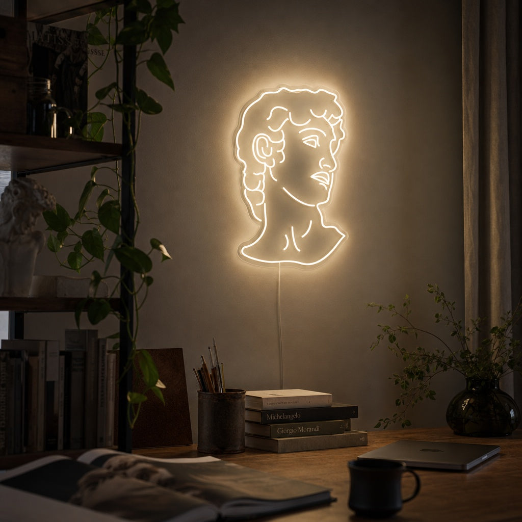 A glowing neon sign depicting Michelangelo's David mounted on a wall in a modern living room setting.