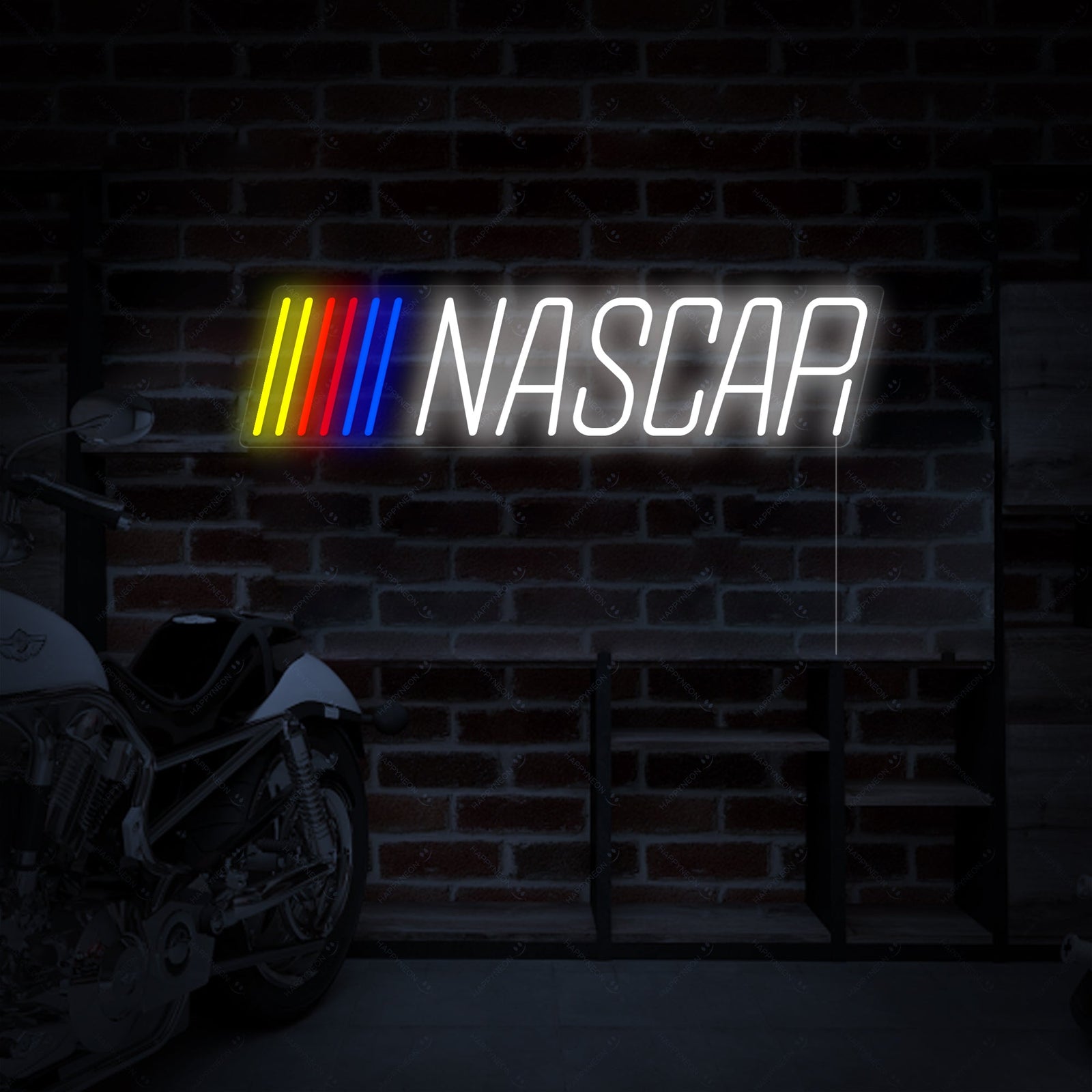 Close-up view of the NASCAR neon light sign showing the vibrant colors and acrylic backing mounted near automotive tools
