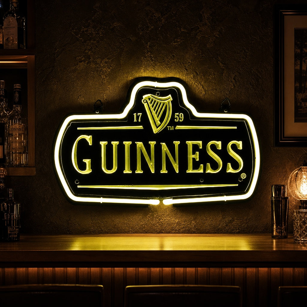 A rectangular neon sign featuring the white text 'GUINNESS' over 'EST. 1759' and 'BEER' within an ornate border, all with raised elements and mounted on a background.