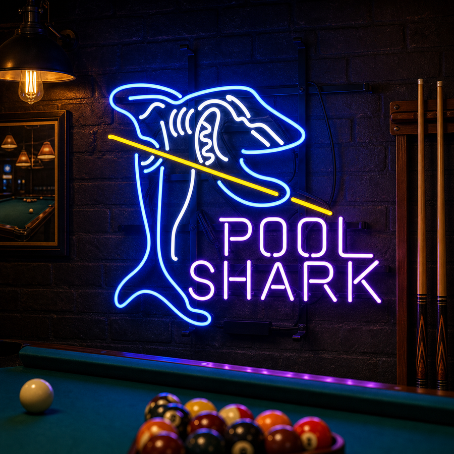 A vibrant, real Pool Shark Billiards neon sign glowing on a brick wall, showing a shark chalking a cue stick.