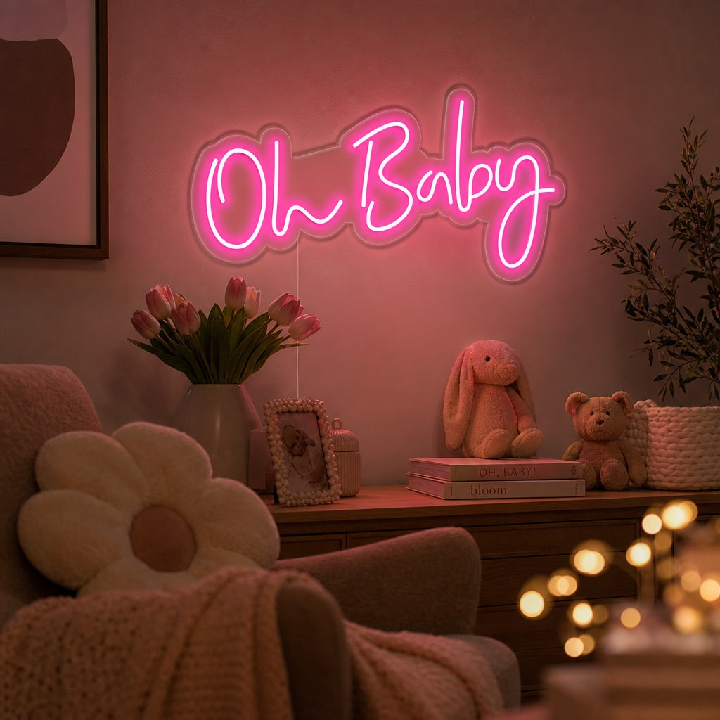 A glowing 'Oh Baby' script neon sign installed as nursery wall decor above a crib.
