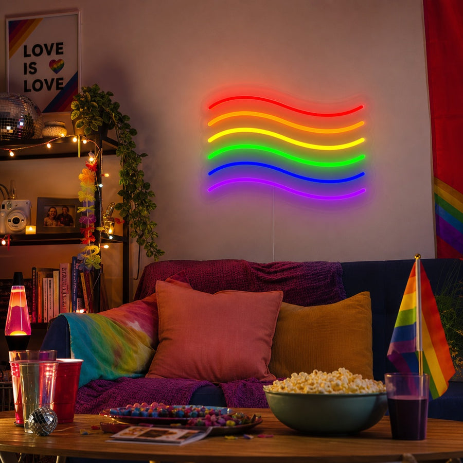 Pride Rainbow Flag neon sign glowing in a stylish, cozy living room above a couch, creating an inclusive atmosphere.