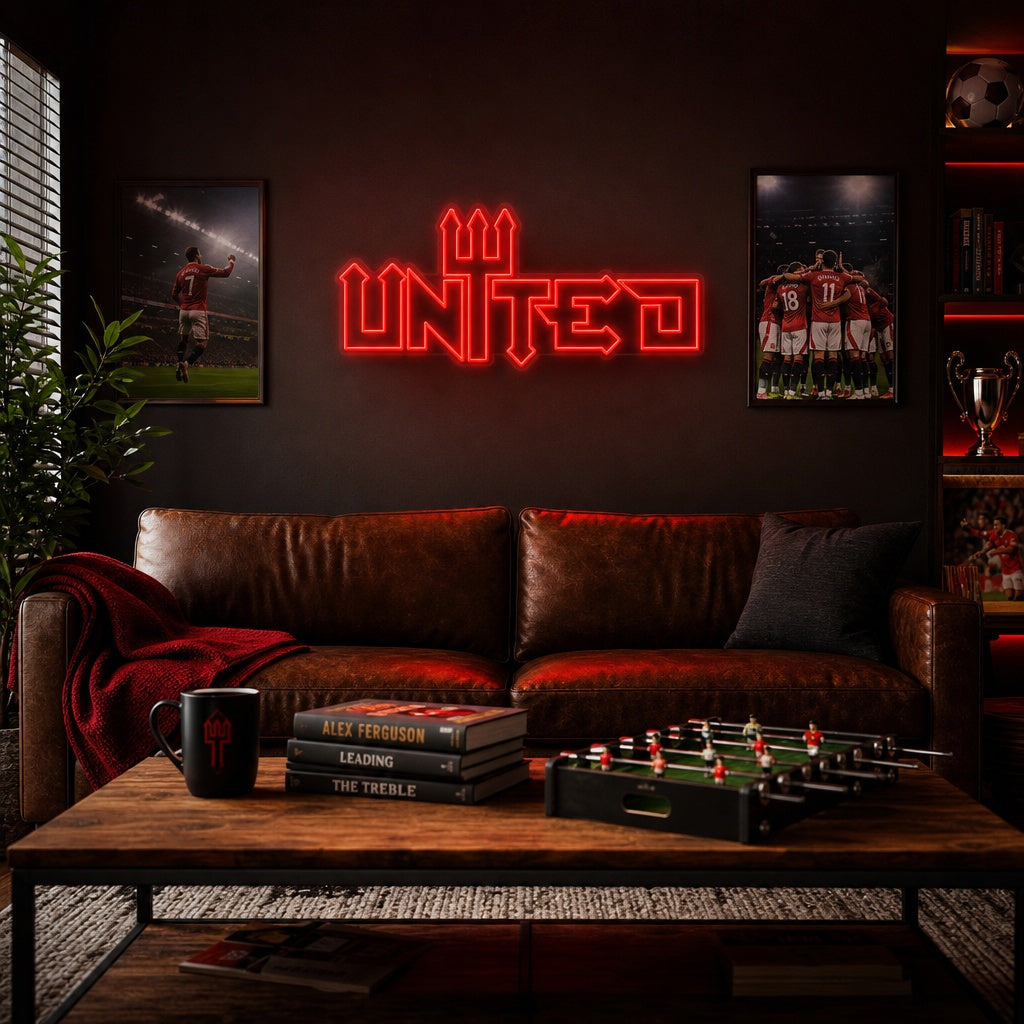 Large 'United Football' neon sign glowing red on a dark wall in a modern living room setting.